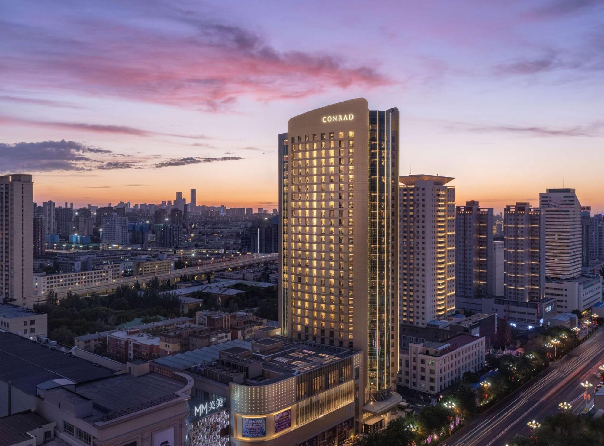 Conrad Urumqi Luaran gambar